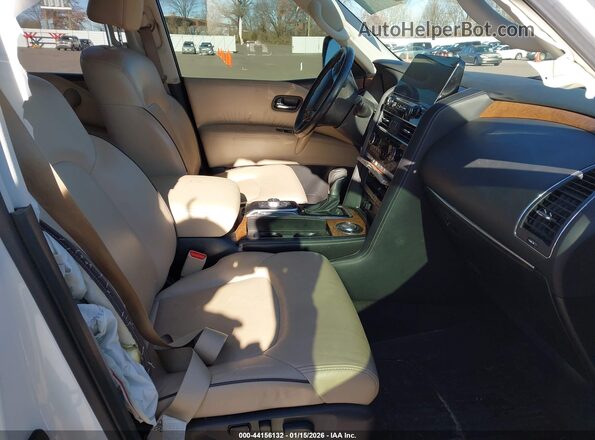 JN8AY2BA6M9370874 2021 NISSAN ARMADA White Vista interior delantera