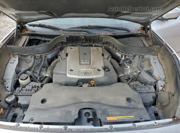 JN8CS1MU2GM130086 2016 INFINITI QX70 Silver Vista interior trasera