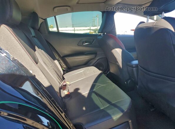 JTDACACUXR3025693 2024 TOYOTA PRIUS Black Vista interior trasera