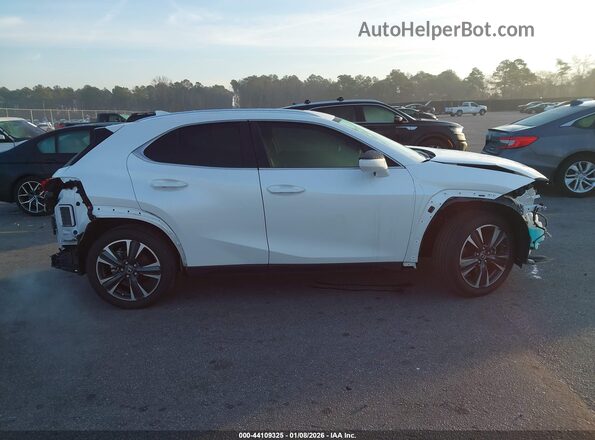 JTHP6JBH7P2145605 2023 LEXUS UX 250H White Vista interior trasera