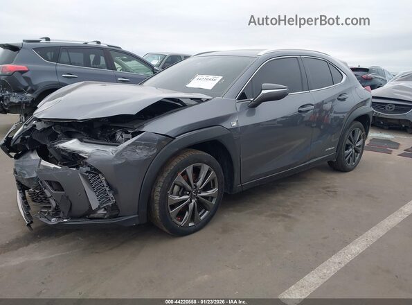 JTHU9JBH4K2002601 2019 LEXUS UX 250H Gray Vista tres cuartos delantera izquierda