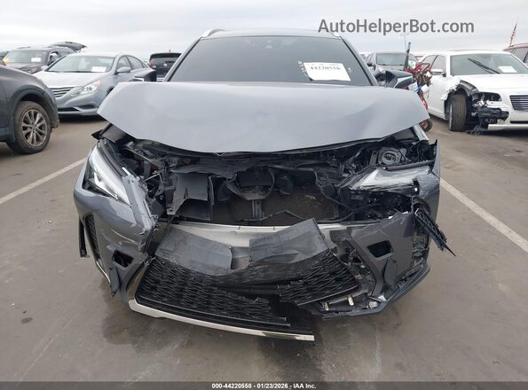 JTHU9JBH4K2002601 2019 LEXUS UX 250H Gray Vista interior trasera