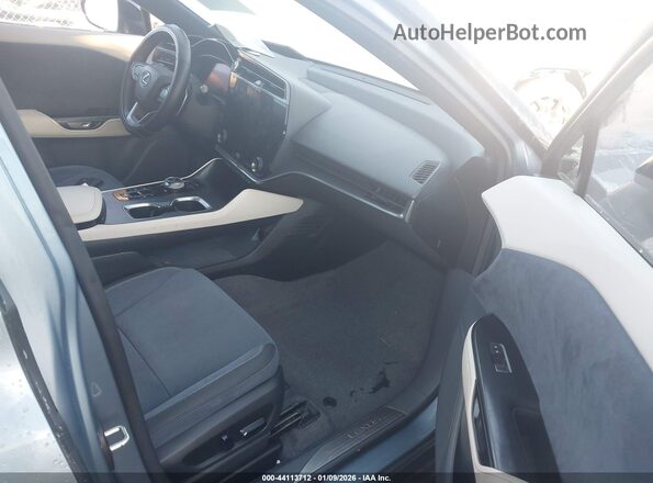 JTJAAAAB7PA011313 2023 LEXUS RZ 450E Синий Вид салона спереди