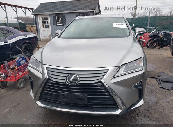 JTJDZKCA7K2018099 2019 LEXUS RX 350L Champagne Widok wnętrza z tyłu