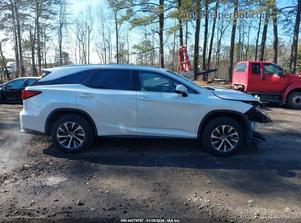 JTJHZKFA2M2030161 2021 LEXUS RX 350L White Widok wnętrza z tyłu