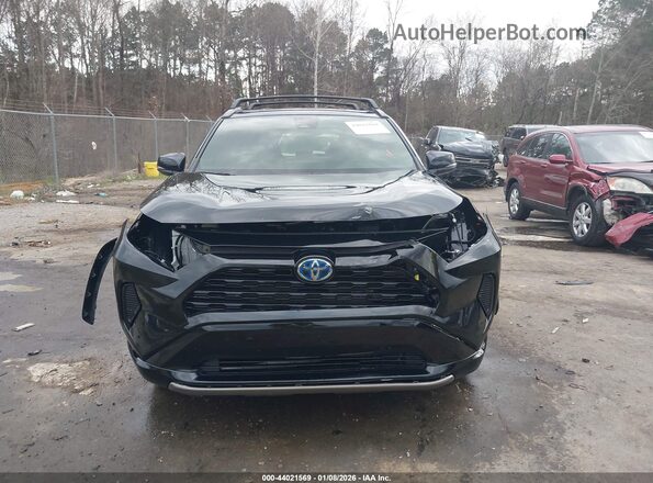 JTM16RFV1ND074960 2022 TOYOTA RAV4 HYBRID Black Widok wnętrza z tyłu