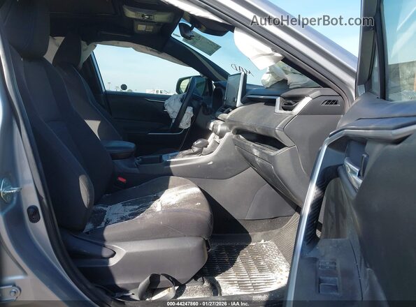 JTM16RFV8ND052499 2022 TOYOTA RAV4 HYBRID Silver Вид салону спереду
