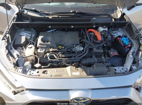 JTM16RFV8ND052499 2022 TOYOTA RAV4 HYBRID Silver Вид ззаду