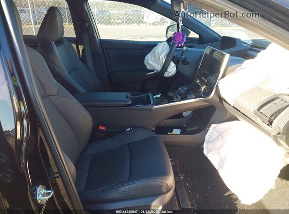 JTMABABA9SA104929 2025 SUBARU SOLTERRA Черный Вид салона спереди