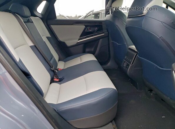 JTMABABAXSA093262 2025 SUBARU SOLTERRA Teal Rear interior view