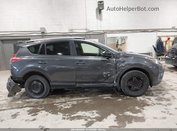 JTMBFREVXHJ173000 2017 TOYOTA LE Gray Vista interior trasera