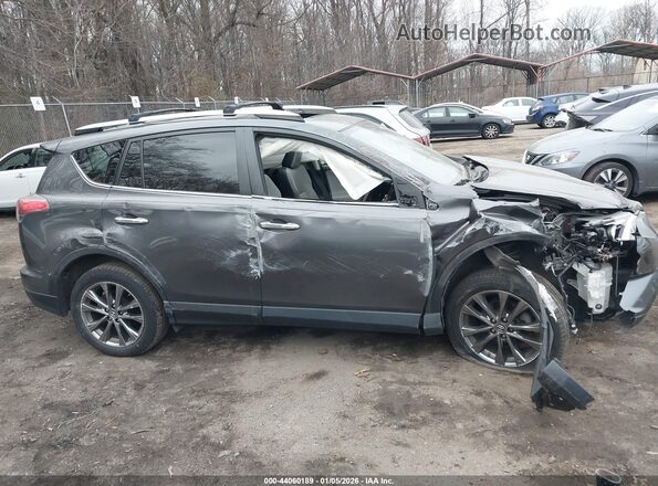 JTMDFREV9JJ238109 2018 TOYOTA LIMITED Gray Вид задньої частини салону