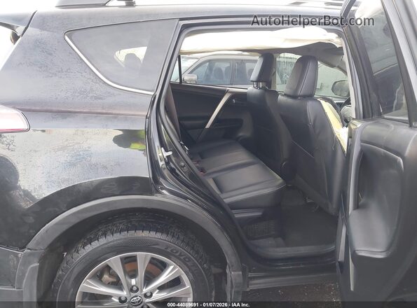 JTMDJREV2GD028618 2016 TOYOTA LIMITED Black VIN კოდის სტიკერის ხედი
