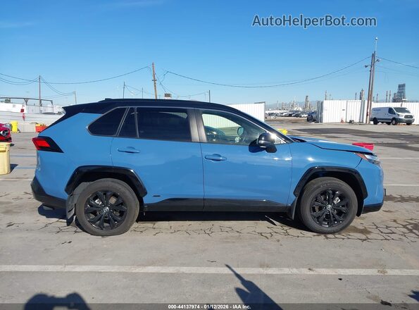 JTME6RFV1ND521837 2022 TOYOTA RAV4 HYBRID Blue Вид задньої частини салону