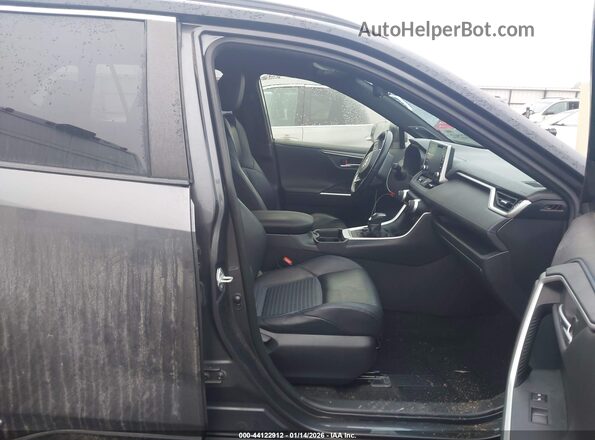 JTMEWRFV9KJ016108 2019 TOYOTA RAV4 HYBRID Gray Front interior view