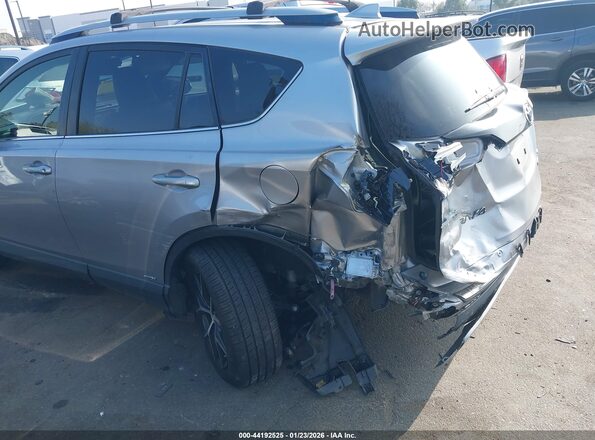 JTMJJREV5JD182041 2018 TOYOTA RAV4 HYBRID Серебряный Вид спереди