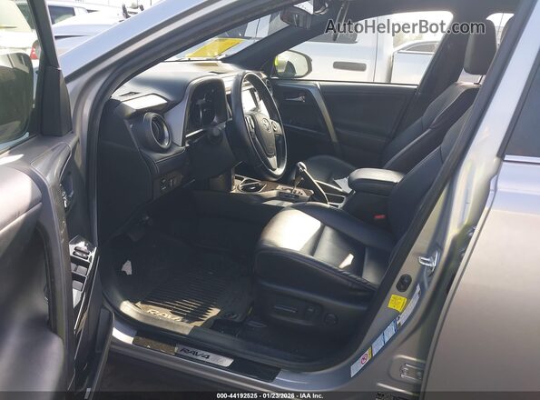 JTMJJREV5JD182041 2018 TOYOTA RAV4 HYBRID Серебряный Вид салона спереди