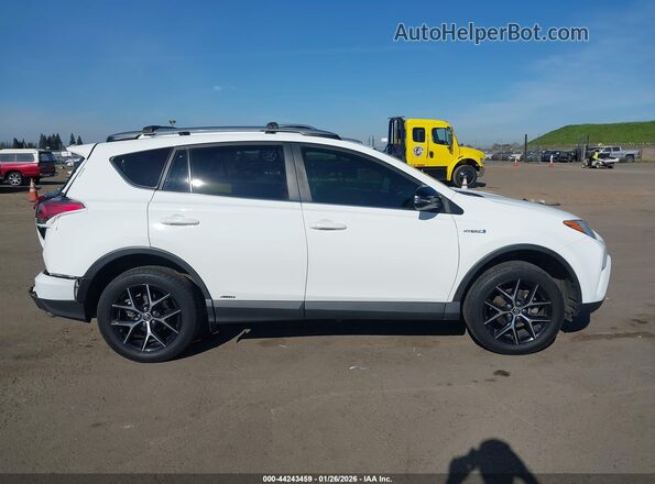 JTMJJREV5JD229925 2018 TOYOTA RAV4 HYBRID White Widok wnętrza z tyłu