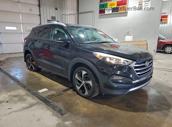 KM8J3CA22GU075438 2016 HYUNDAI TUCSON Black Przód prawy