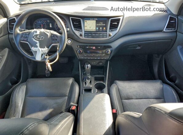 KM8J3CA28GU130880 2016 HYUNDAI TUCSON Черный Вид панели приборов