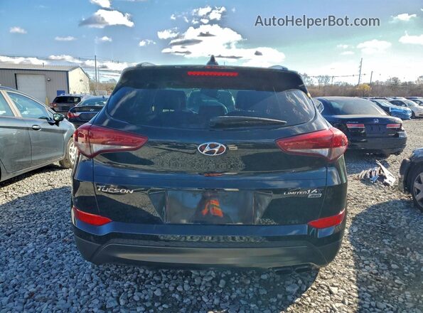 KM8J3CA28GU130880 2016 HYUNDAI TUCSON Черный Вид сзади