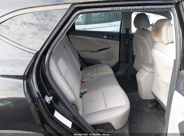 KM8J3CA41GU101299 2016 HYUNDAI TUCSON Black 