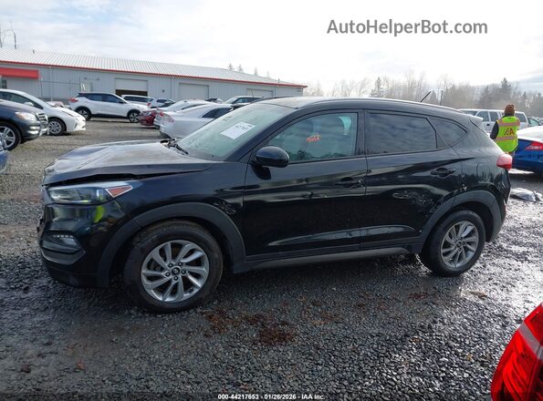 KM8J3CA41GU101299 2016 HYUNDAI TUCSON Black Vista interior trasera