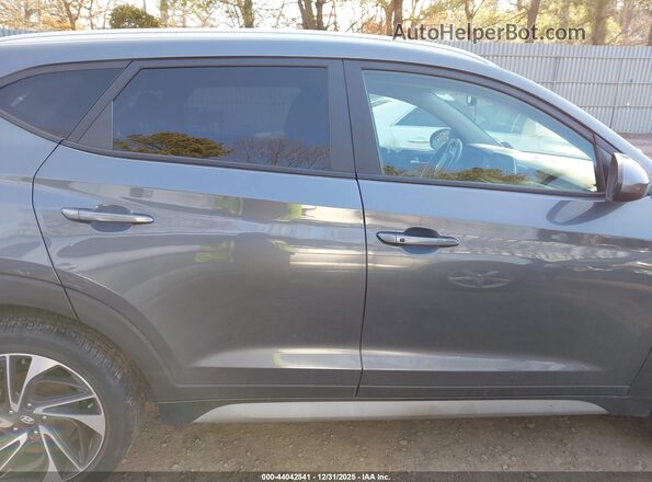 KM8J3CAL3MU406189 2021 HYUNDAI TUCSON Gray უკანა სალონის ხედი