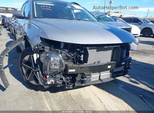 KM8JCDD14SU352852 2025 HYUNDAI TUCSON HYBRID Серебряный Вид задней части салона