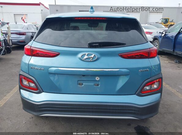 KM8K33AG7KU024672 2019 HYUNDAI KONA EV Teal 