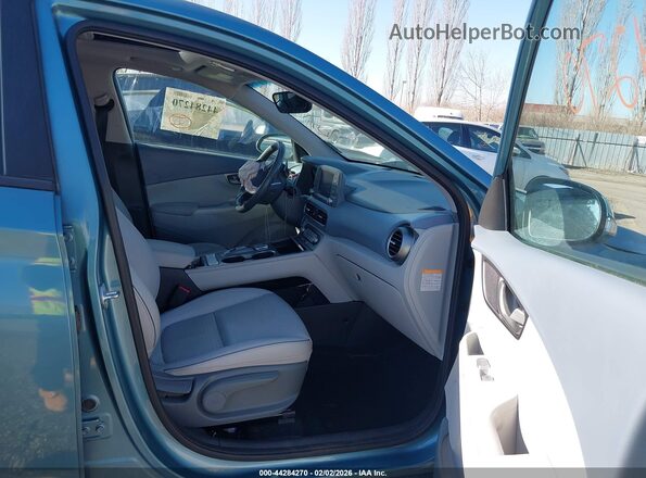KM8K33AG7KU024672 2019 HYUNDAI KONA EV Teal 