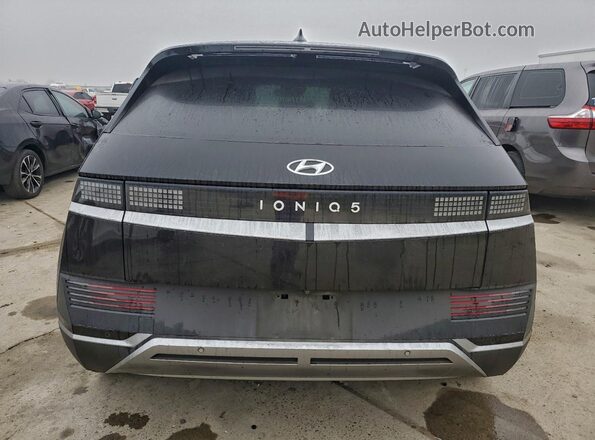KM8KM4AE5NU067669 2022 HYUNDAI IONIQ Black Հետևի տեսք