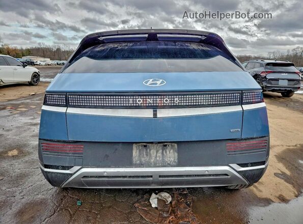 KM8KNDAF1NU049028 2022 HYUNDAI IONIQ Синий Вид сзади