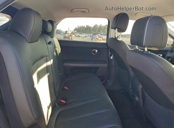 KM8KNDAF6PU232217 2023 HYUNDAI IONIQ White Rear interior view