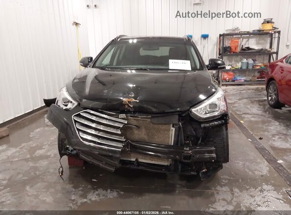 KM8SRDHF6GU159084 2016 HYUNDAI SANTA FE Black Widok wnętrza z tyłu