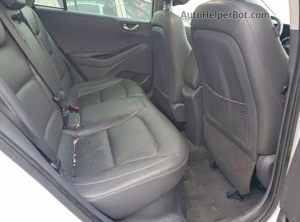 KMHC05LCXJU066349 2018 HYUNDAI IONIQ White Vista de los asientos traseros