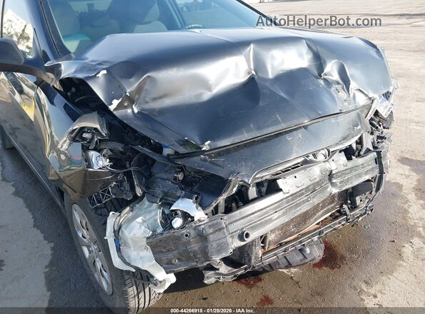 KMHCT4AE1HU374638 2017 HYUNDAI ACCENT Black Front view