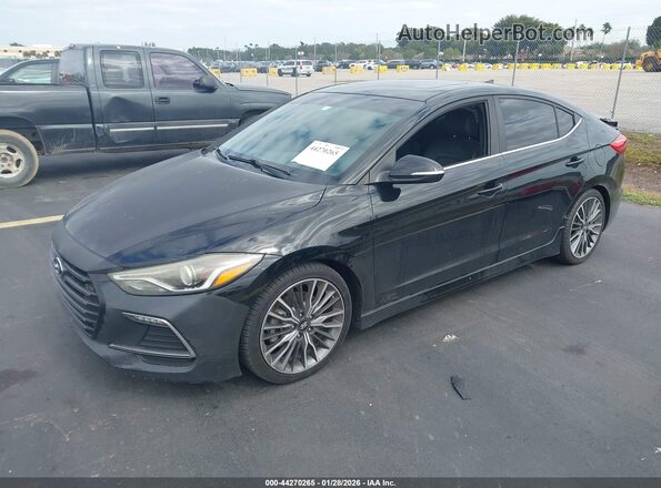 KMHD04LB8JU512777 2018 HYUNDAI ELANTRA Black Vista tres cuartos delantera izquierda