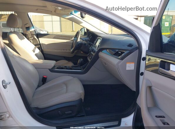 KMHE34L39KA093197 2019 HYUNDAI SONATA HYBRID White წინა სალონის ხედი