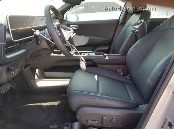 KMHM34AC9SA085471 2025 HYUNDAI IONIQ Silver Front interior view