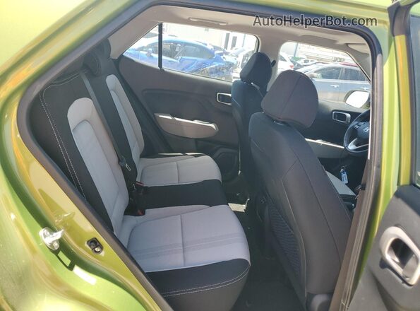 KMHRC8A31RU331984 2024 HYUNDAI VENUE Green Rear interior view