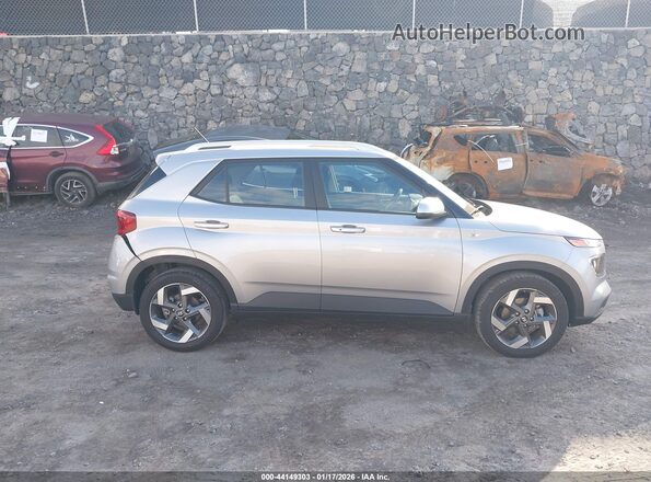 KMHRC8A34RU329565 2024 HYUNDAI VENUE Silver Rear interior view