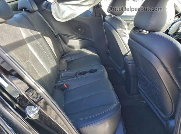 KMHTC6AE0GU303165 2016 HYUNDAI VELOSTER Black Rear seats view