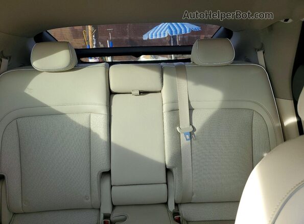 KMUKCDTC9PU002469 2023 GENESIS GV60 White Rear seats view