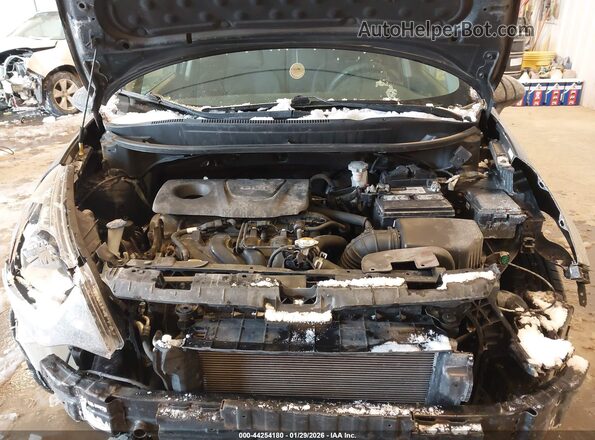 KNADM4A37H6086337 2017 KIA RIO Black Rear view
