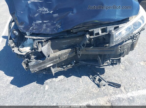 KNAFK5A82J5773706 2018 KIA FORTE Blue Front view