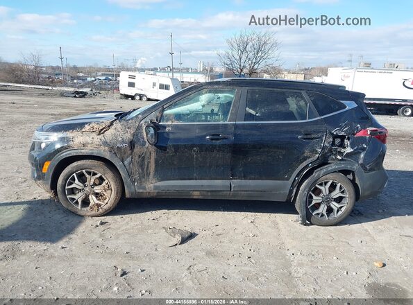 KNDERCAA5M7152308 2021 KIA SELTOS Black Vista interior trasera