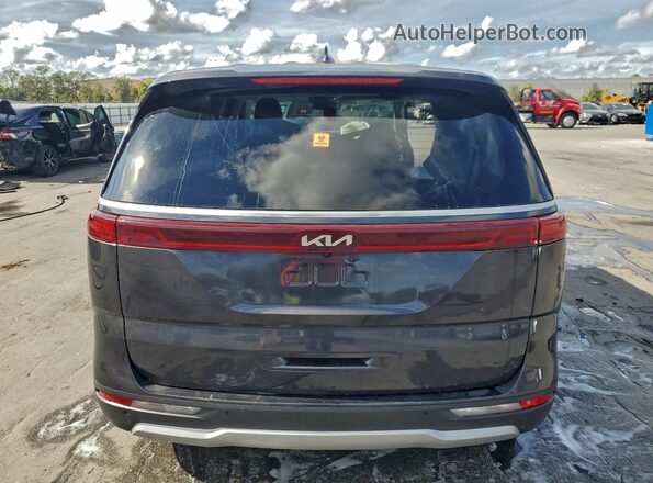 KNDNB4H32P6197296 2023 KIA CARNIVAL Серый Вид сзади