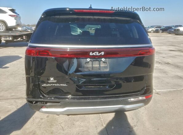KNDNB4H38N6134474 2022 KIA CARNIVAL Black Rear view