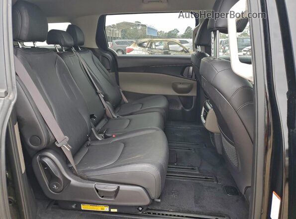 KNDNB5K30S6461106 2025 KIA CARNIVAL Черный Вид задней части салона